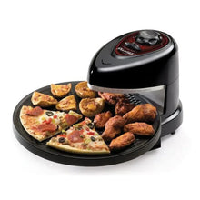 Rotating pizza oven with pizza slices and fried snacks on tray, black housing