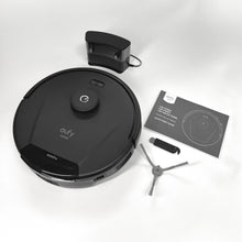 Robot vacuum kit with charging dock, side brush, and instruction booklet