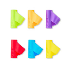 Six silicone pencil grips in bright colors: green, orange, purple, red, blue, yellow