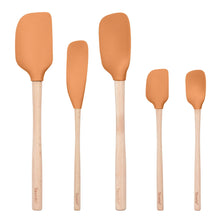 Set of 5 apricot silicone spatulas with light wood handles, varying head sizes