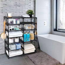 Black 7-tier shoe rack with open wire shelves storing towels, toiletries, and folded goods.