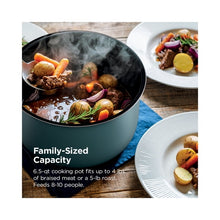 Ninja pressure cooker with steaming braised meat and vegetables in the pot