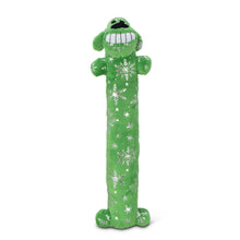 Plush dog loofa toy in green with white snowflake pattern and stitched face details