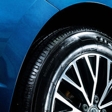 Car wheel and tire with glossy, treated finish