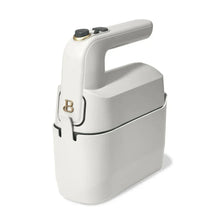 Drew Barrymore 6-speed electric hand mixer in white, compact design