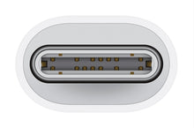 Lightning connector end with visible contact pins on braided adapter cable
