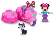 Pink Minnie Mouse vehicle with Minnie figure, small animal figures, pink bow headpiece