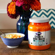 Chicken bone broth protein powder jar with bowl beside it