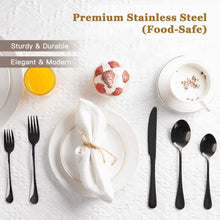 Black stainless steel flatware set with forks and spoons, mirror-polished handles.