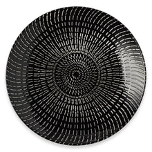 Black stoneware dinner plate with concentric radial stripe pattern