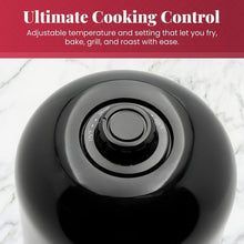 Compact air fryer top panel with circular temperature setting knob.
