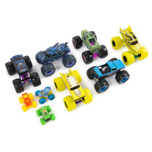 Monster truck toy set of nine vehicles with colorful painted bodies and oversized treaded tires