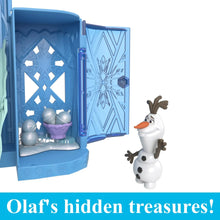 Frozen ice palace dollhouse with open side, icy door panels, and Olaf figure