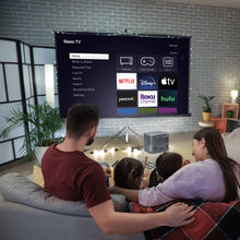Projector projecting streaming app menu on a wall-mounted screen