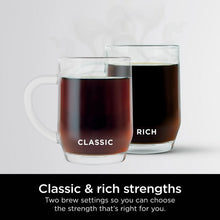 Two glass coffee mugs filled with dark coffee