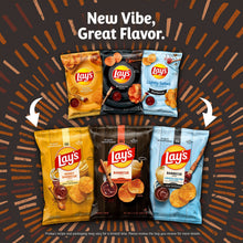 Assorted Lay's chip bags arranged in two rows on orange burst background