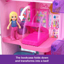 Pink dollhouse interior with doll figure, tiled bathroom, and purple bed