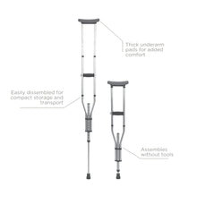 Adjustable aluminum crutches with gray underarm and hand pads, black rubber tips