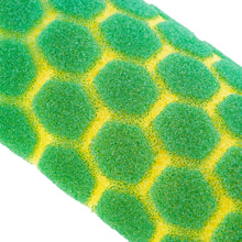 Close-up of green and yellow honeycomb-textured sponge pad on a mop head.