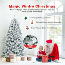 Snow flocked artificial Christmas tree with dense branches, 6 ft