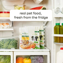 Freshpet dog food bags in an open refrigerator