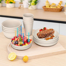 Beige wheat straw dinnerware set on tray with plates, bowls, and cups