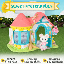 Bakery dollhouse with pink roof, cupcake stand, and mouse figure