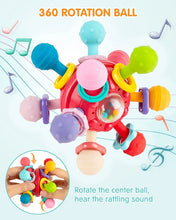 Red 360 rotating teething ball rattle with textured grips and colorful sensory bumps