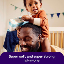 Baby wipes pack held during use by baby and parent, fragrance-free premium wipes