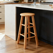 Natural wood backless counter stool with round top seat and ladder-style side slats