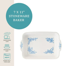 White rectangular baking dish with blue floral panel pattern, with lid