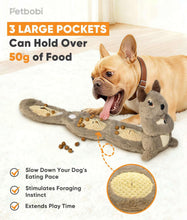 Grey plush squirrel dog toy with treat dispenser belly pouch and scattered treats