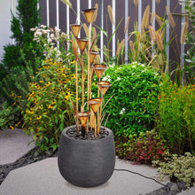 Calla lily-style fountain with copper tiers and black stone pot, water flowing