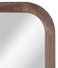 Walnut wall mirror with curved frame edge and reflective glass surface