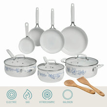 Agatha Blue ceramic cookware set with matching pots and pans, stainless lids, and wood handles