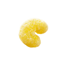 Single curved, golden cheddar puff with a lightly textured surface.
