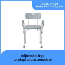 Gray bath and shower chair with backrest and armrests, adjustable legs