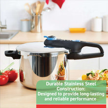 Stainless steel pressure cooker with blue steam release knob on the lid