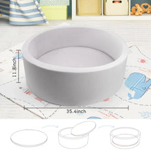Gray foam ball pit with open top, round bowl shape for play