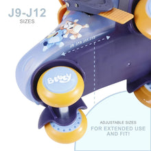 Close-up of adjustable kids roller skate wheel and light blue frame with orange trim