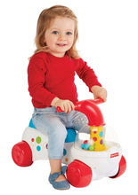 Children’s ride-on corn popper toy with red horn, clear dome, and multicolor balls