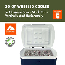 Hard-sided wheeled cooler with dark navy body and open white lid