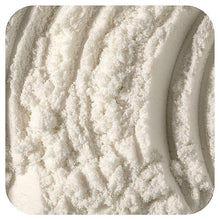 Collagen coconut creamer powder, fine off-white granules close-up