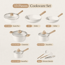 Nonstick cookware set arrangement with white pans, glass lids, wood handles