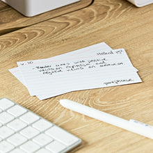 White ruled index card with handwritten notes and blue lines, 3x5