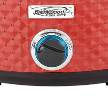 Red slow cooker temperature dial labeled OFF/LOW/HIGH/WARM with blue indicator ring.