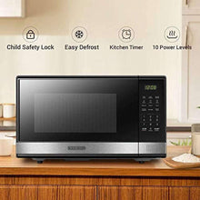 Black stainless microwave oven with control keypad and child safety lock icon