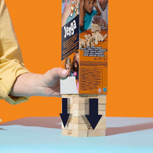 Jenga game retail box with an arrow graphic and visible wooden blocks