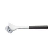 Angled dish brush with white bristle head and black soft-touch handle