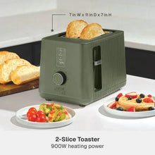 Dusty moss 2-slice toaster on counter with raised bread slots